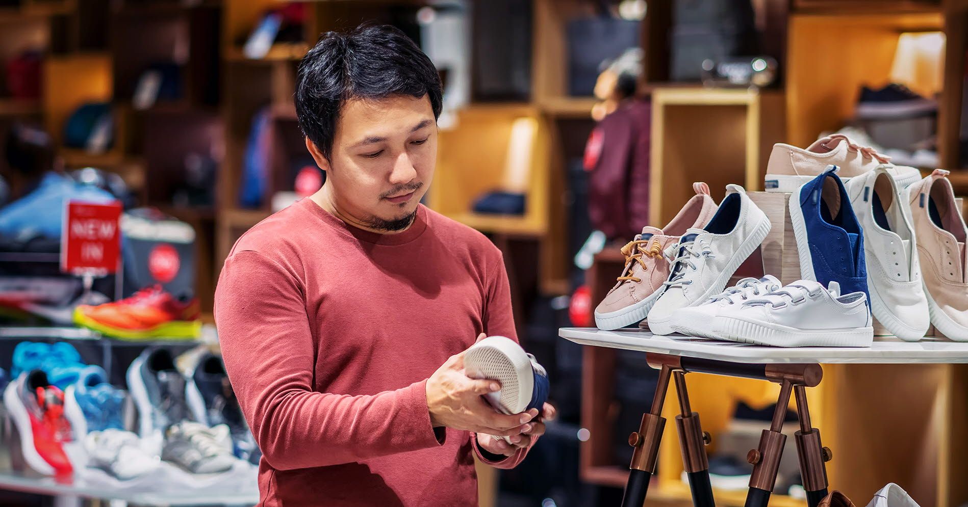 Person looking at shoes in a store