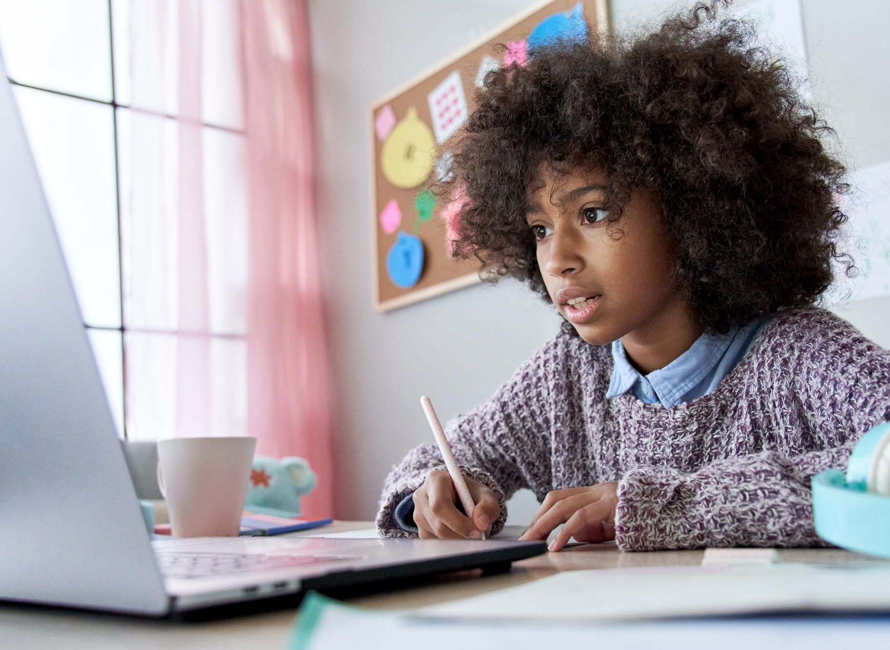 Girl doing online schooling