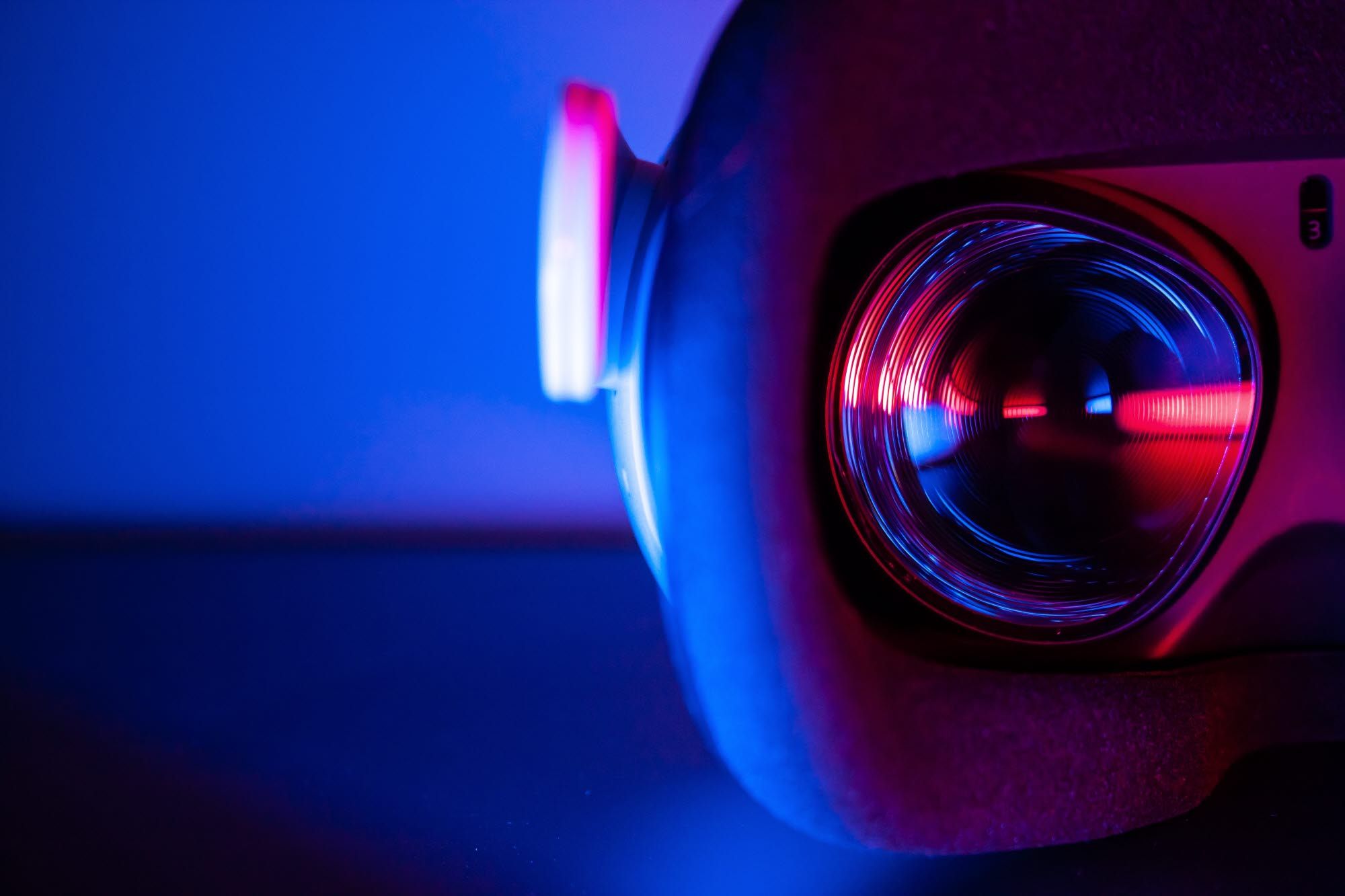 VR headset on a table, looking at the left lens from the viewer's persepective