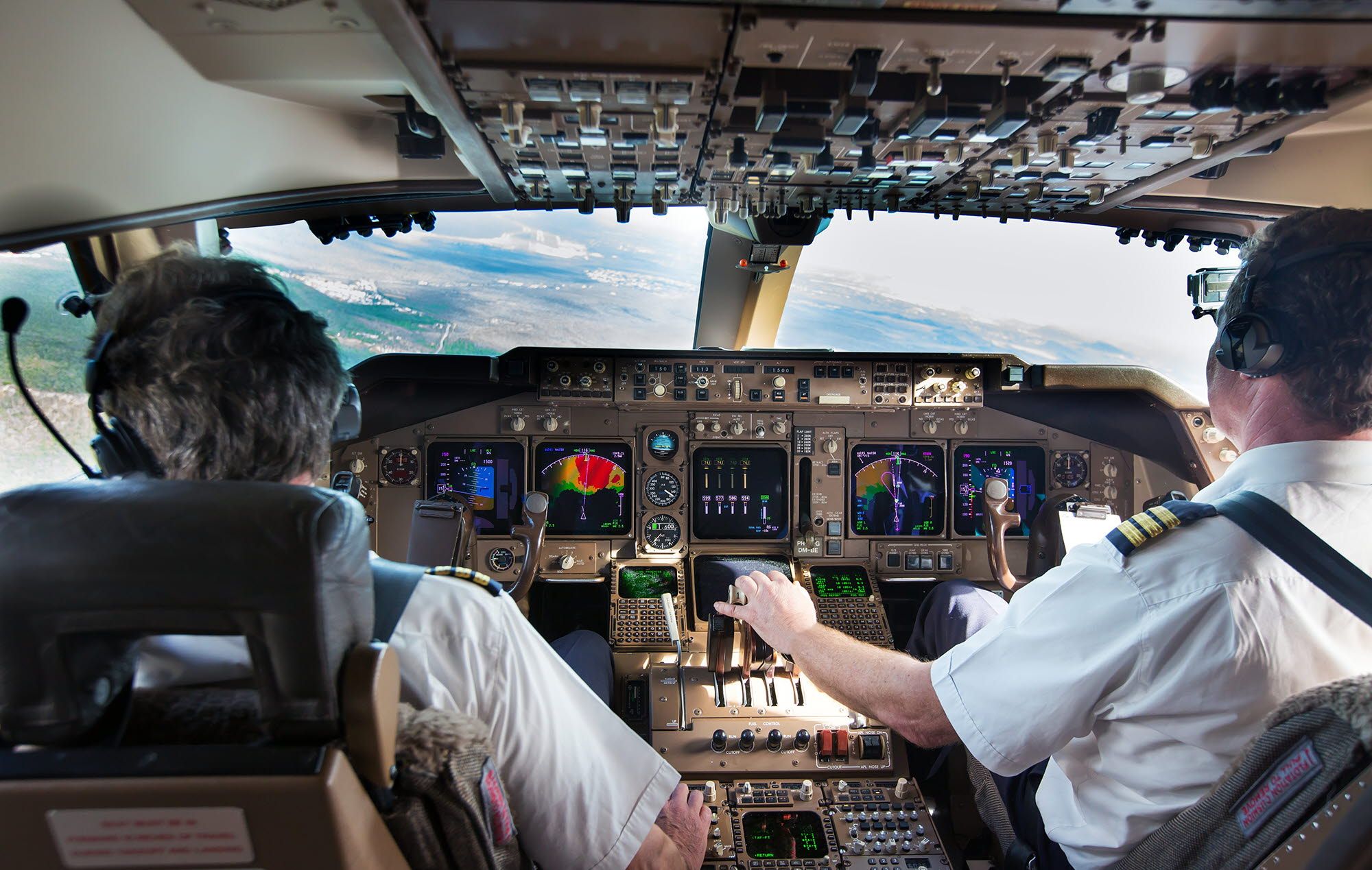 2 pilots in a cockpit