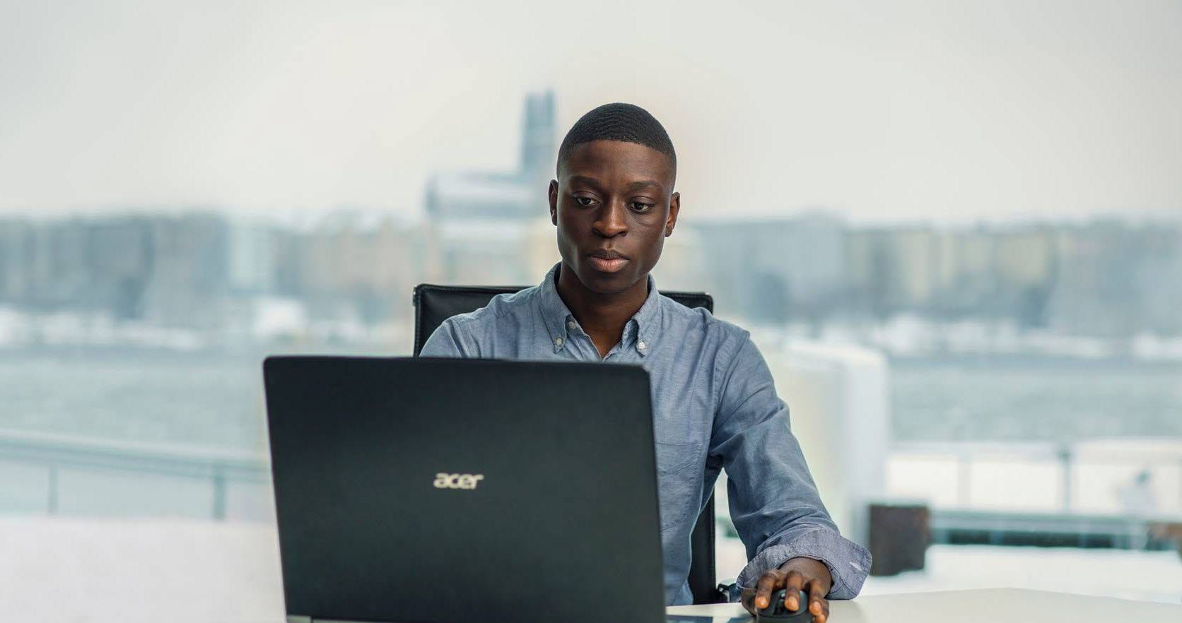 Man in front of a laptop