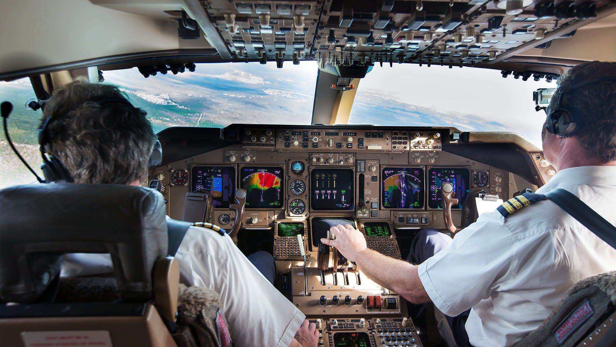 2 pilots in a cockpit