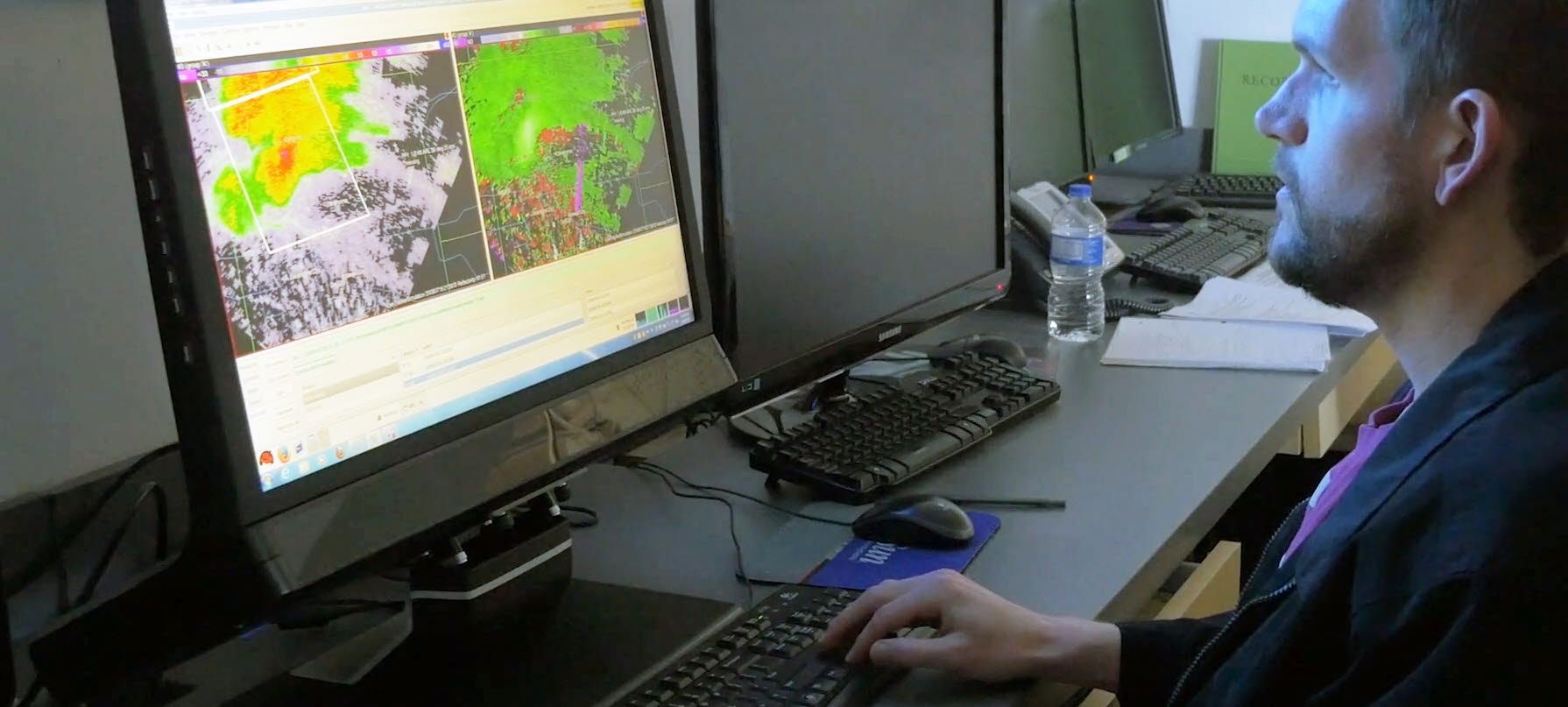 Person looking at a weather screen using eye tracking