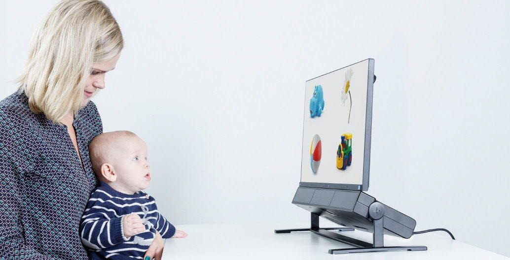 Baby in front of an eye tracker used for child development research