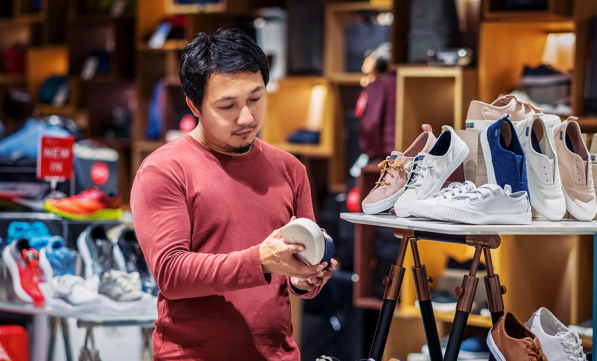 Person looking at shoes in a store