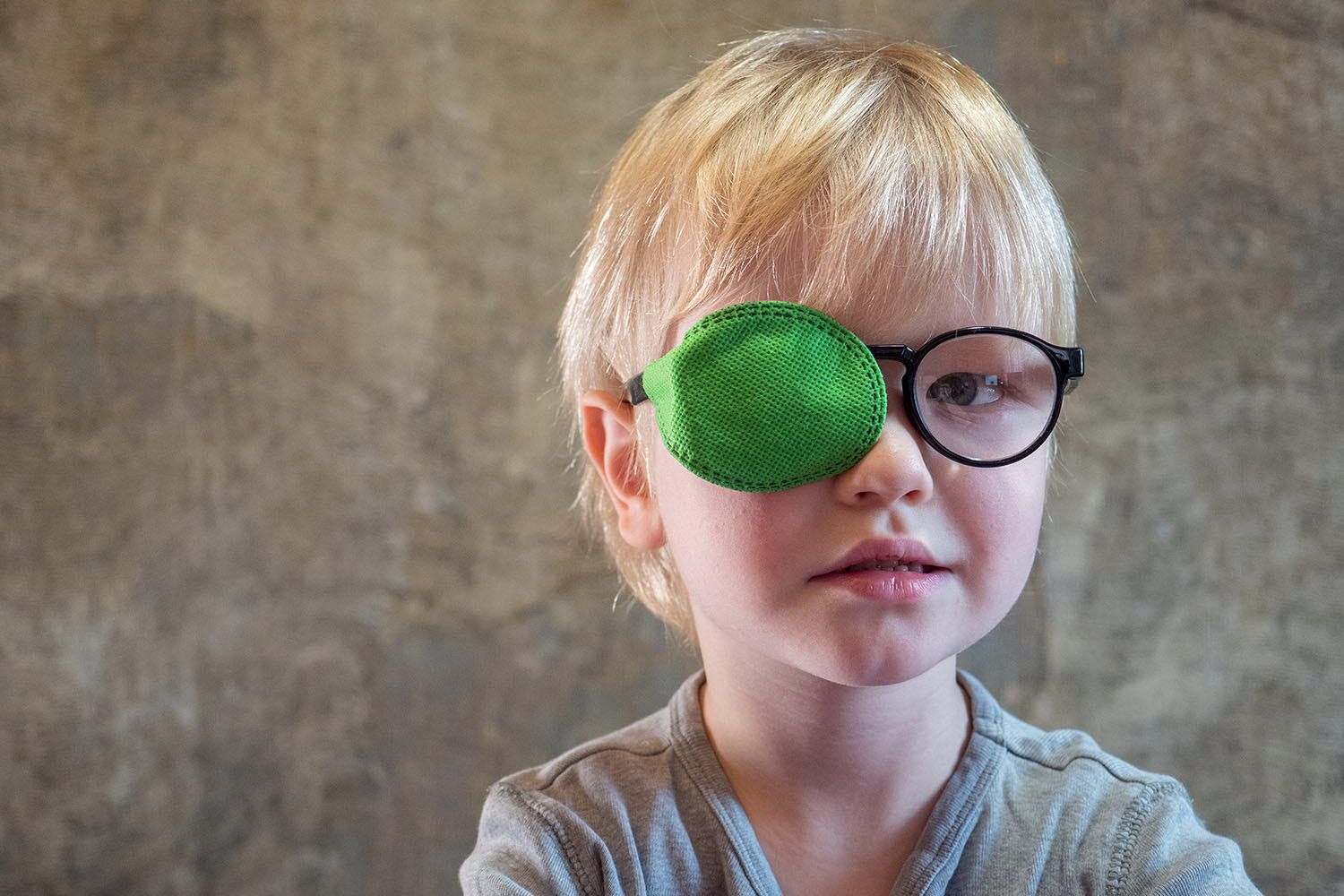 Child with an eye patch