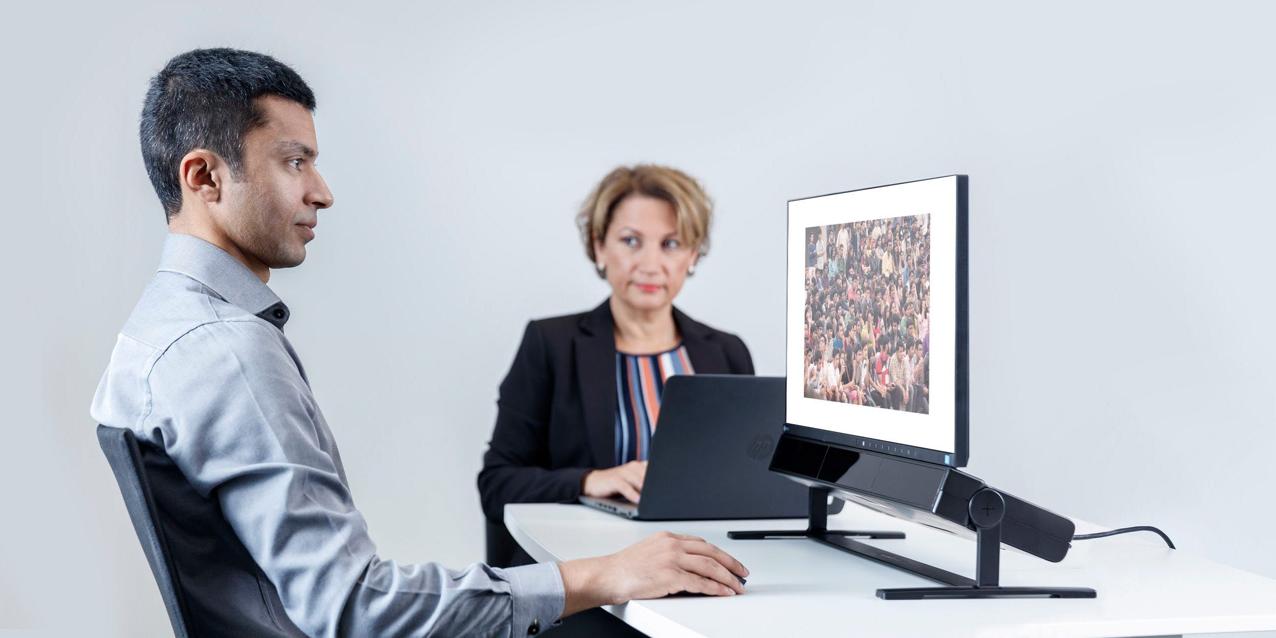 Man looking at Tobii Pro Spectrum