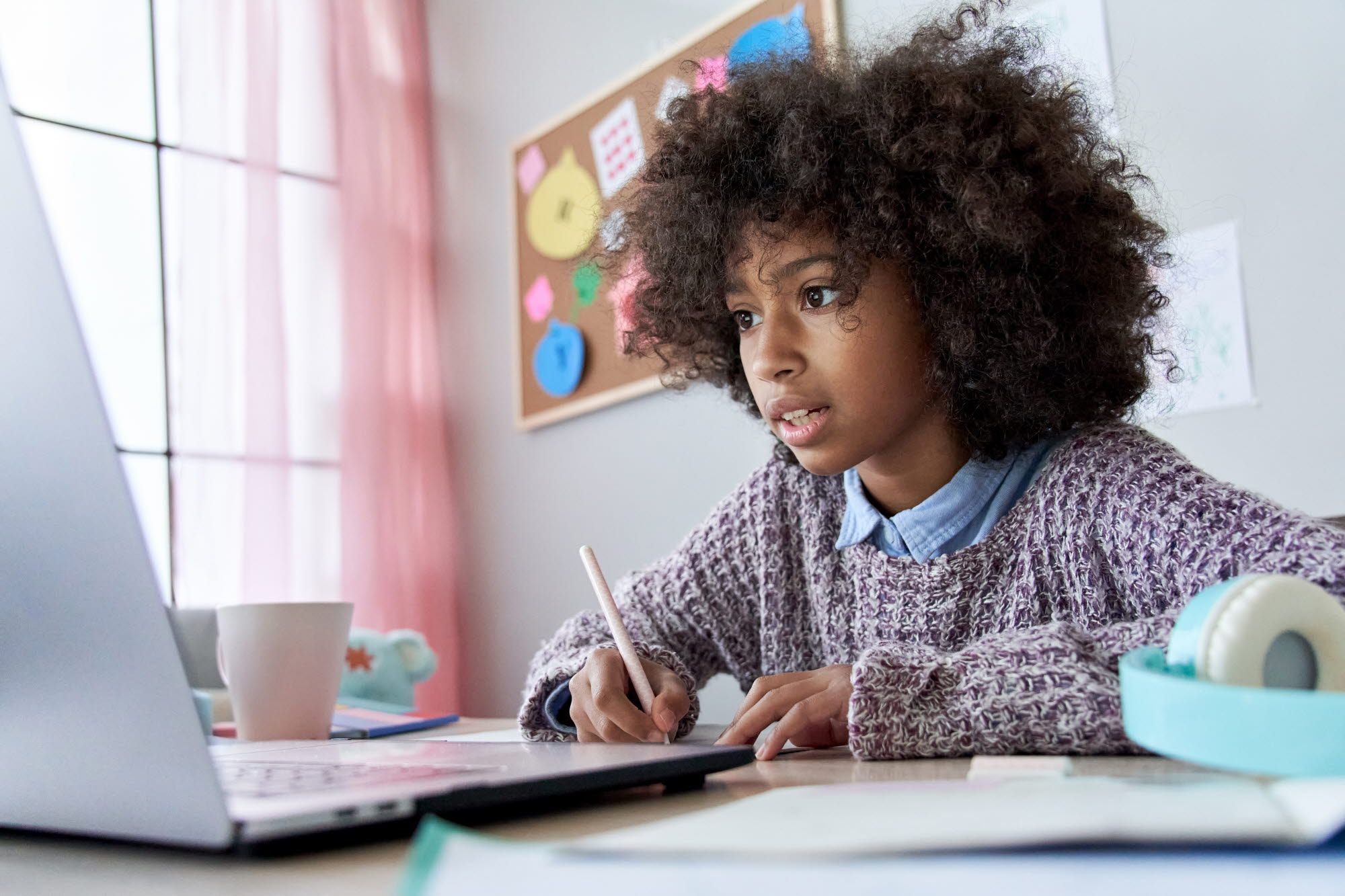 Girl doing online schooling