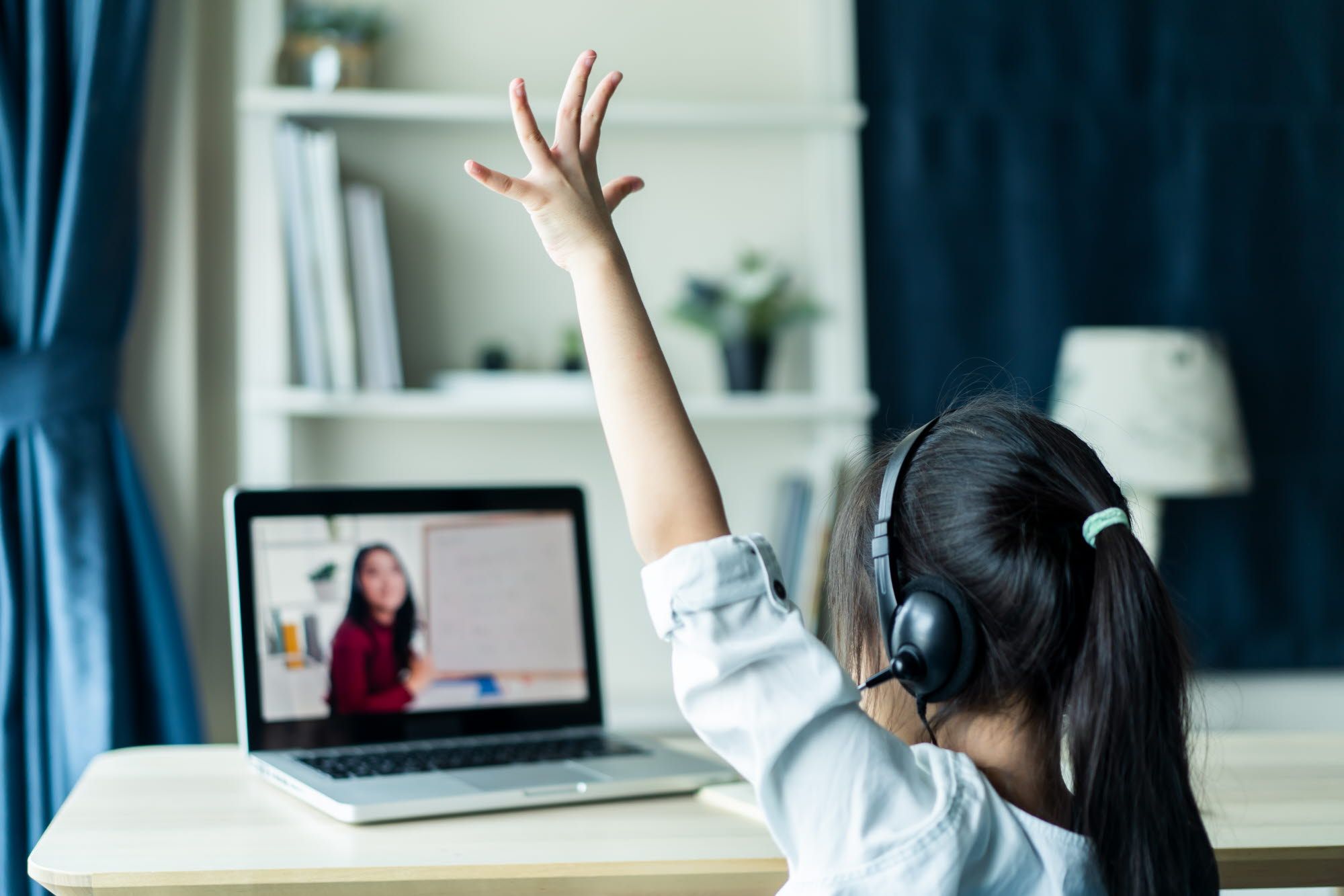 Young girl learning online