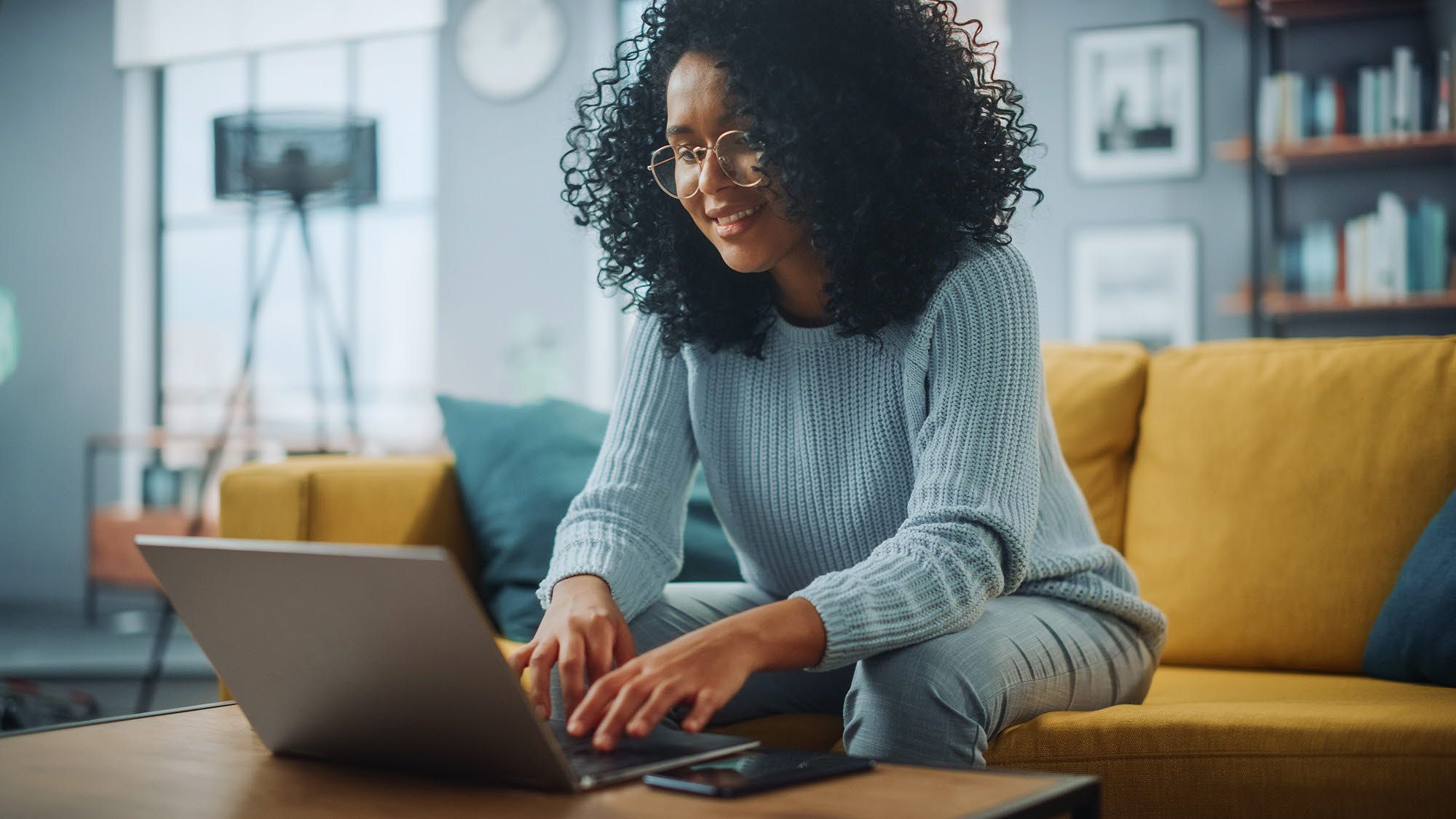 Woman at a laptop - webcam eye tracking