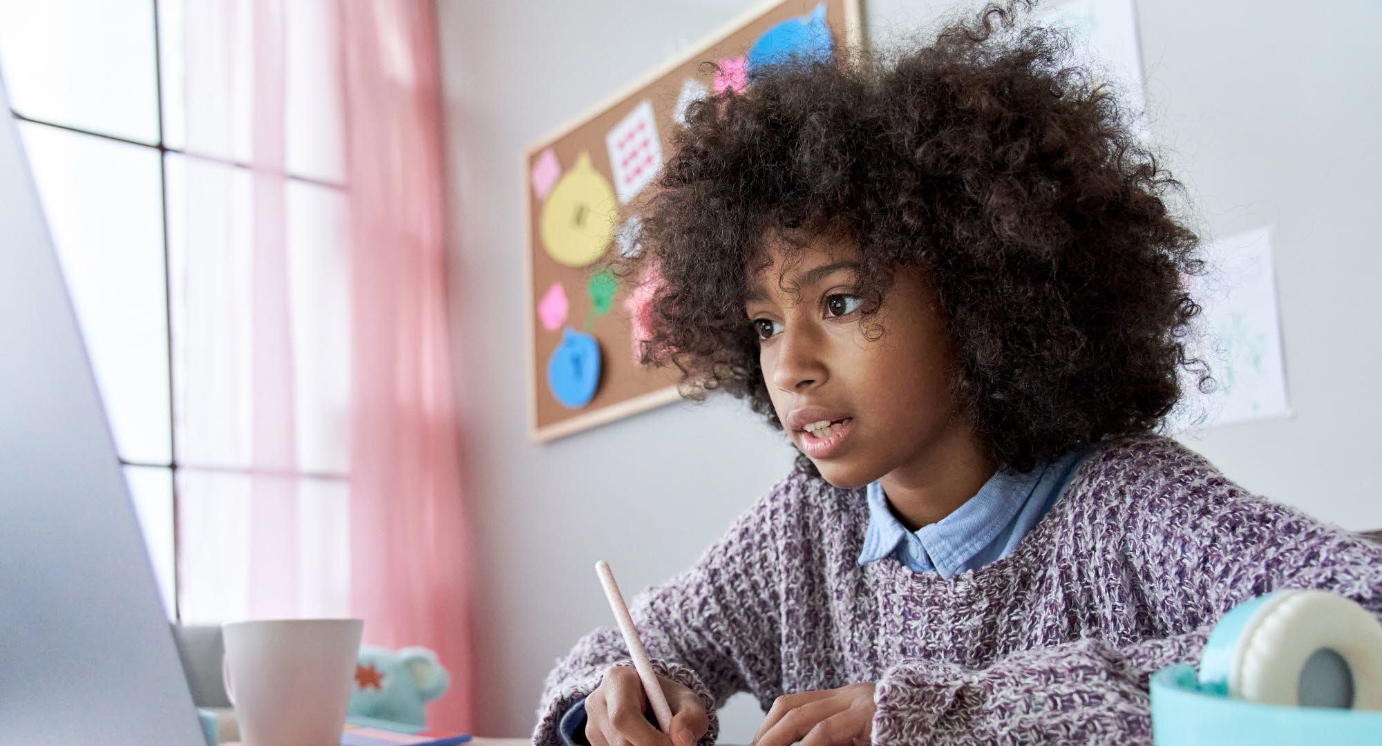 Girl doing online schooling