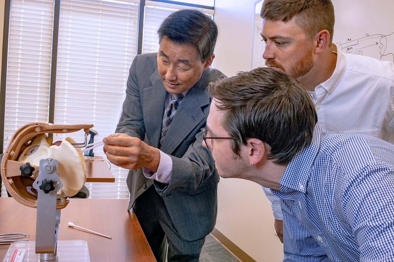 Dr. Miyazaki teaching OBGYN students 