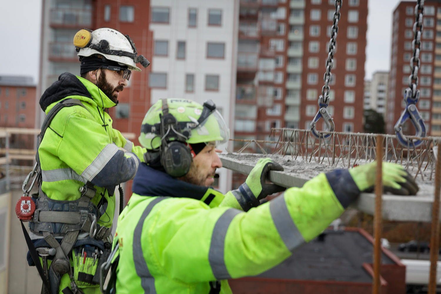 Workers at a construction site using eye tracking glasses