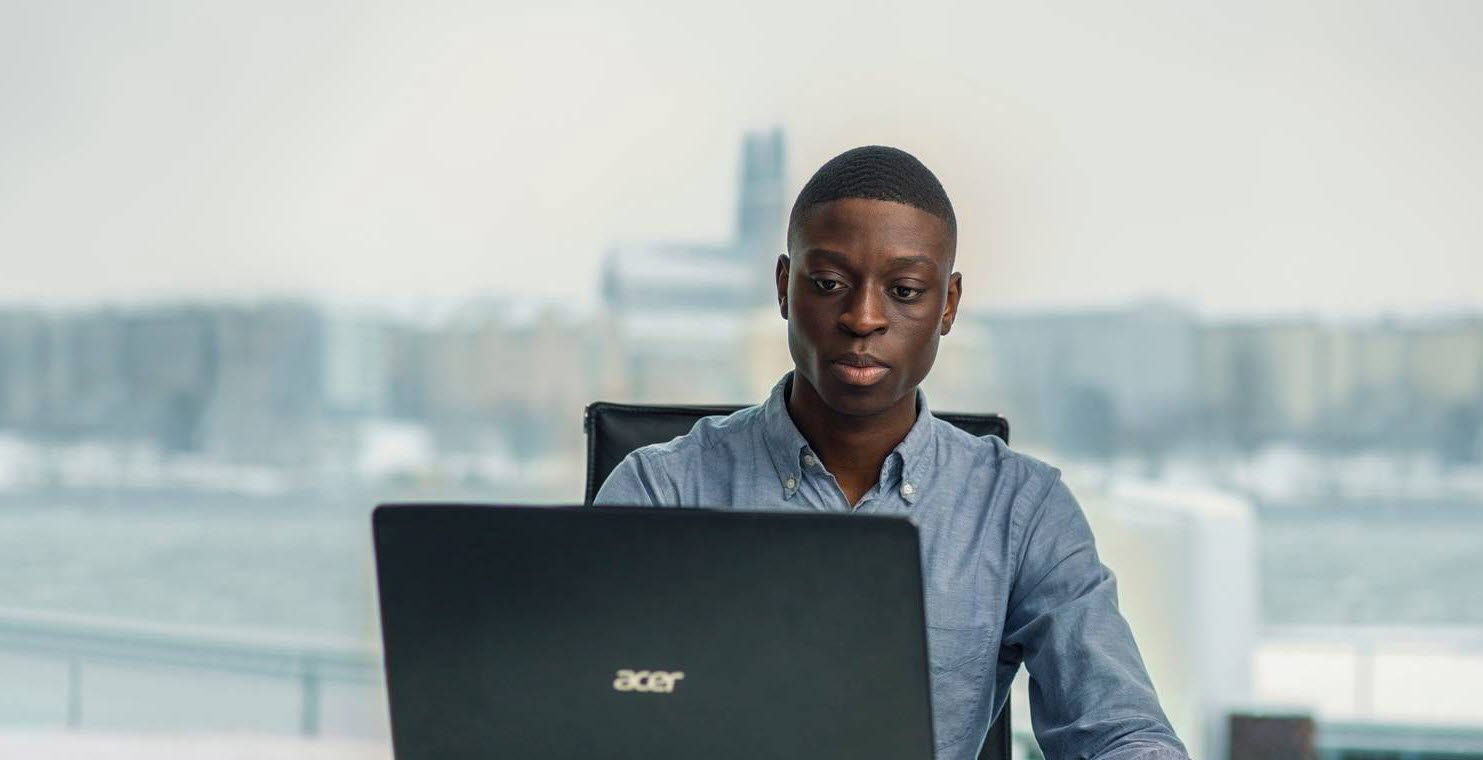 Man in front of a laptop