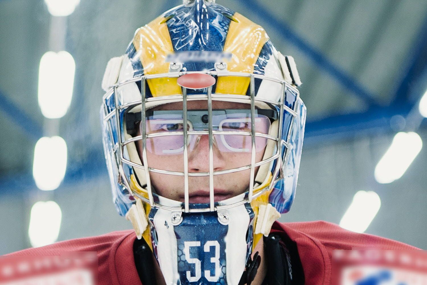 Ice hockey goalie wearing eye tracking glasses