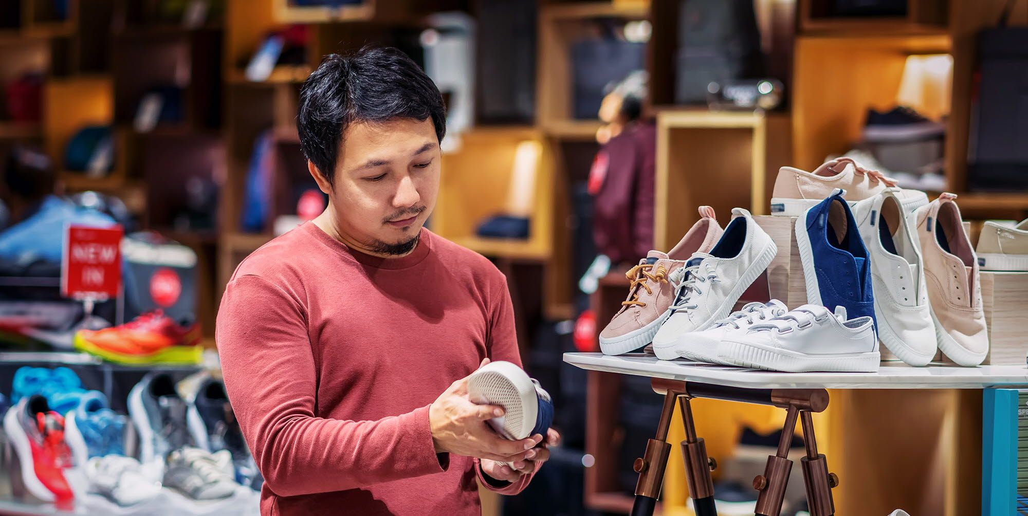 Person looking at shoes in a store