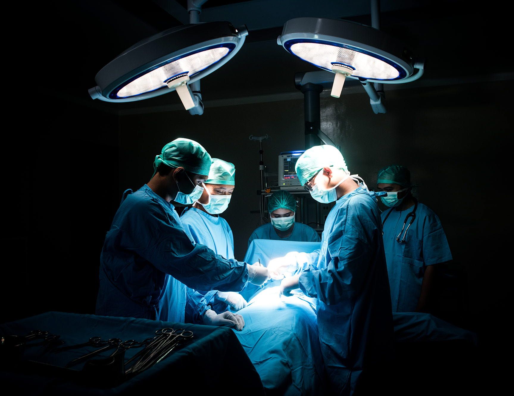 Surgeons working on a patient