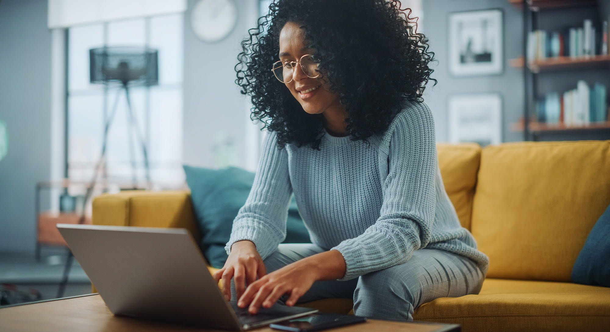 Woman at a laptop - webcam eye tracking