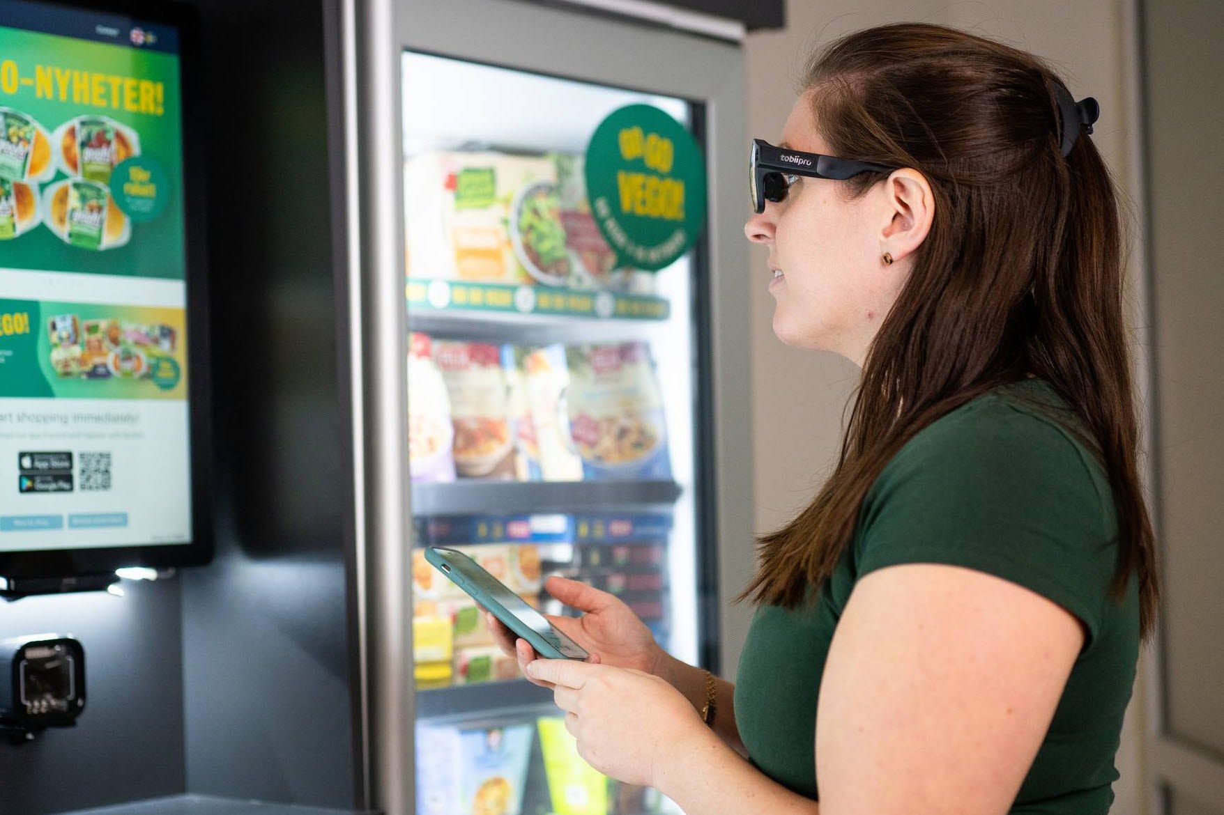 Woman wearing Tobii Pro Glasses 3 convenience machine