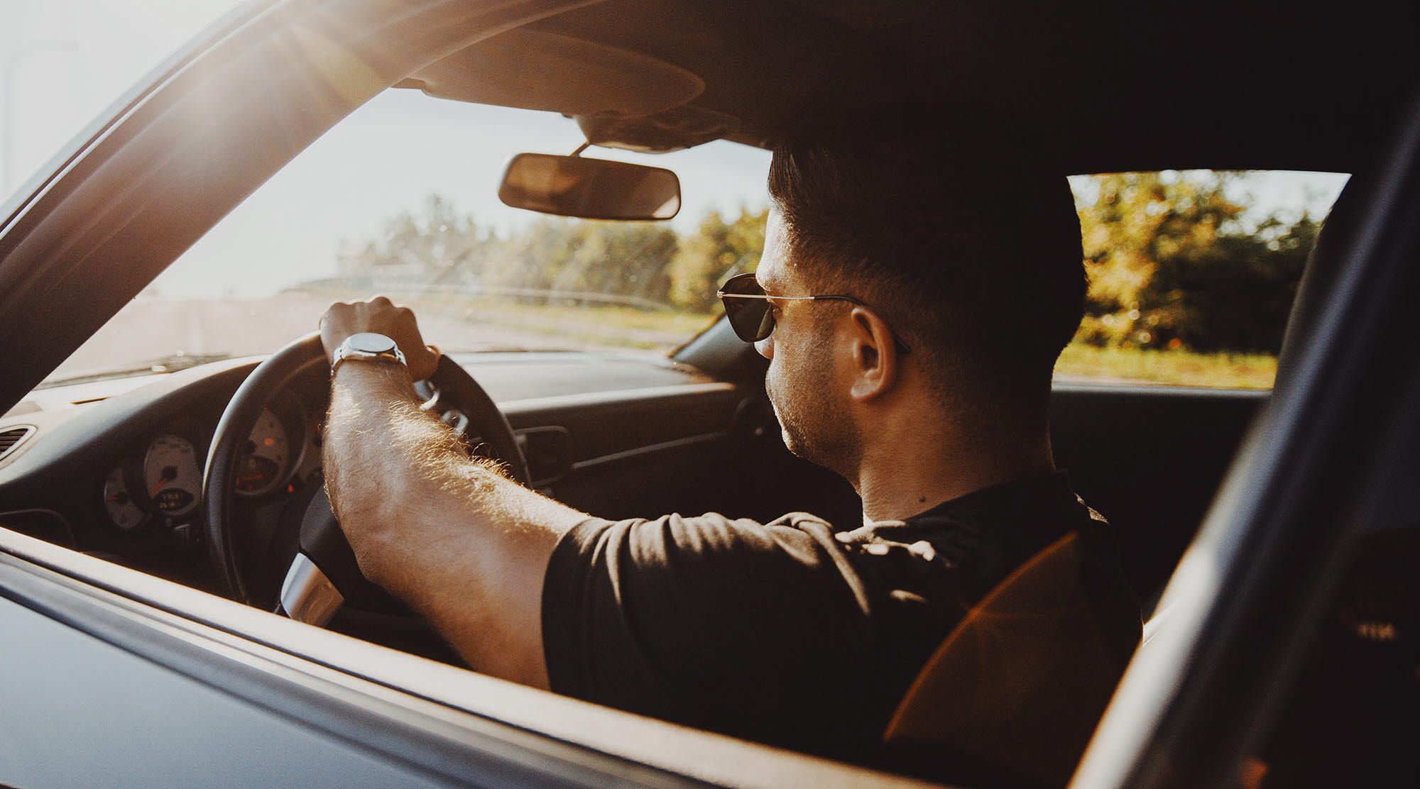 Man driving a car