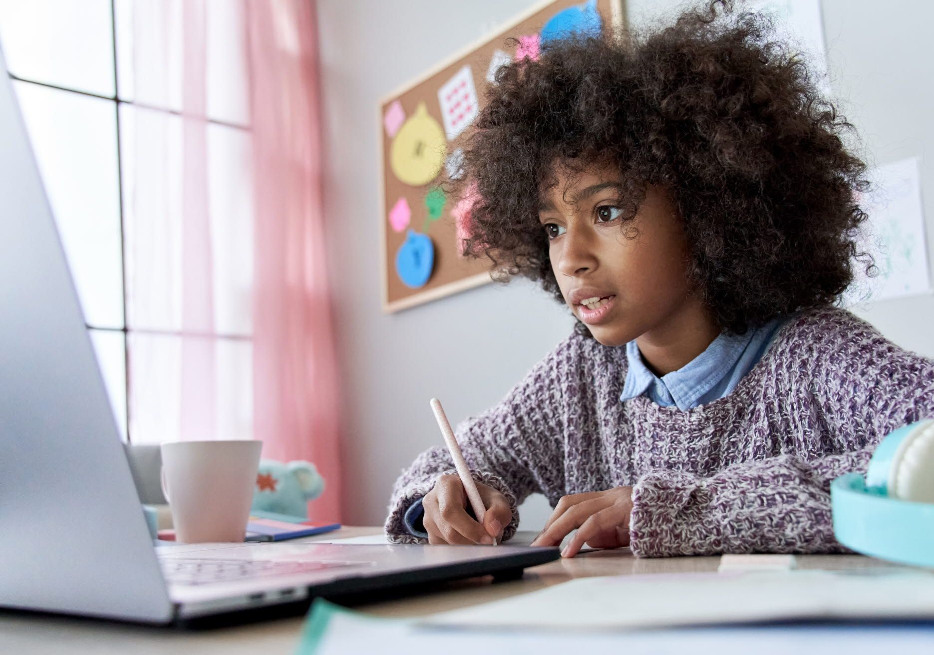 Girl doing online schooling