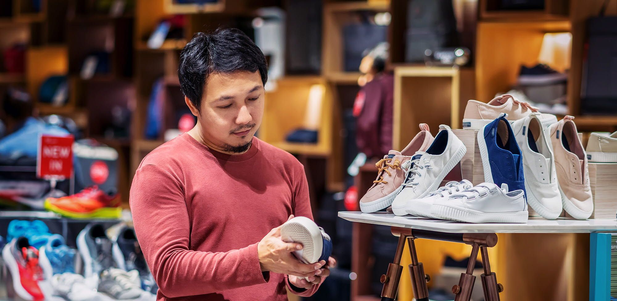 Person looking at shoes in a store