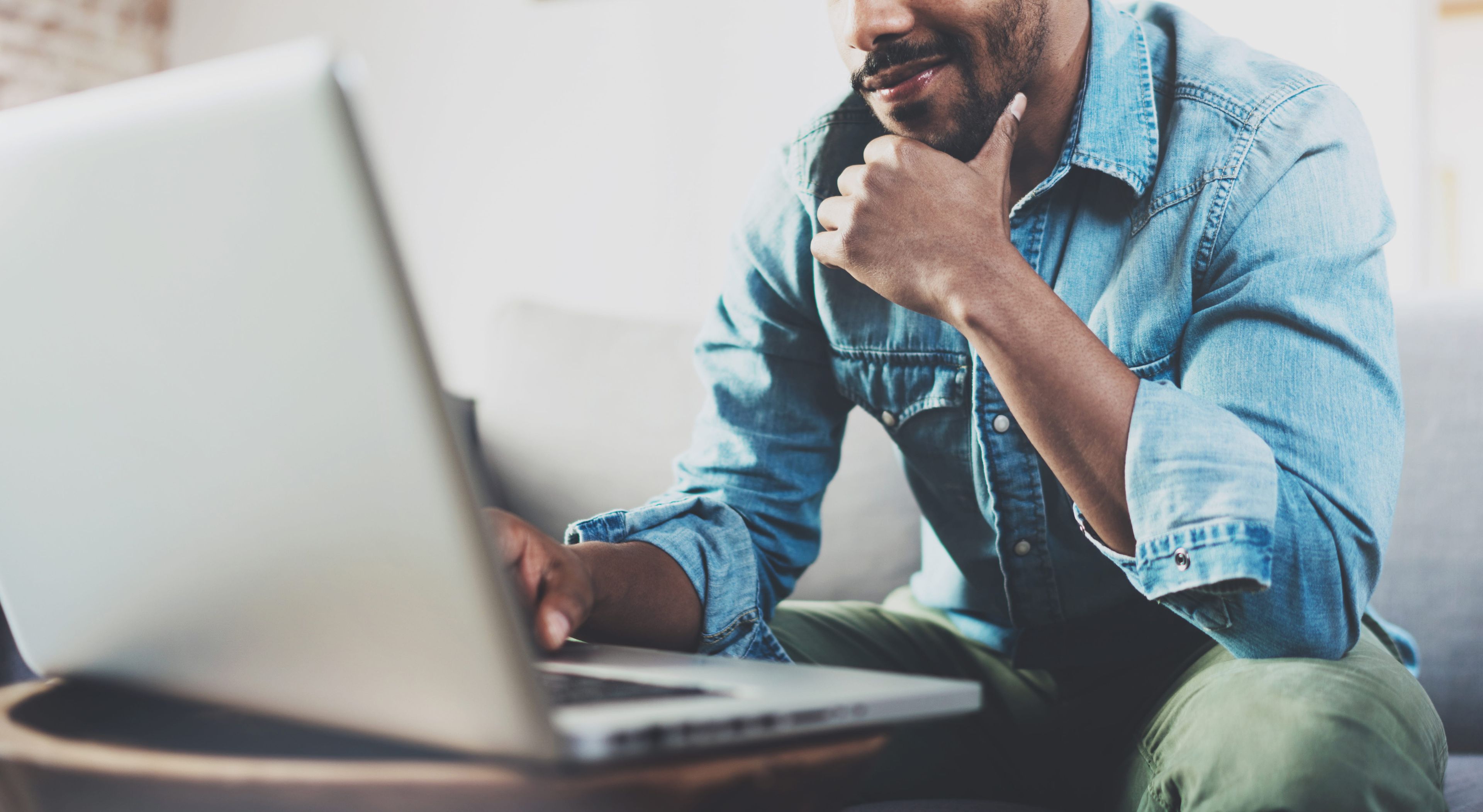 Man sitting in front of a computer